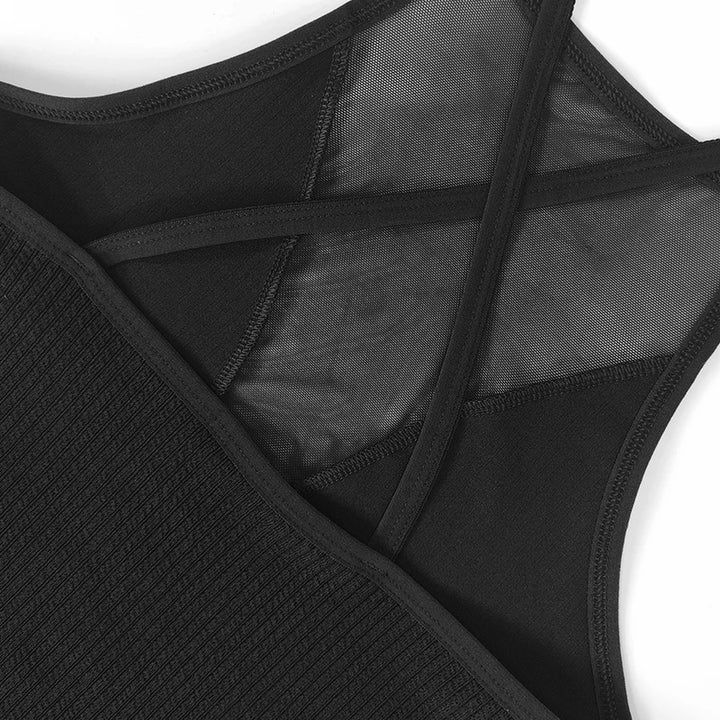 Close-up of the Women’s Mesh Backless Crop Top in black, featuring ribbed fabric on one side and sheer mesh panels with crisscross straps on the other.